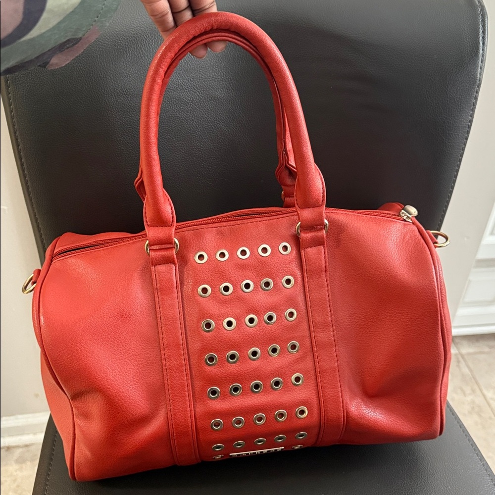 CAPRESE Stylish Red Handbag with Eyelet Design - Picture 11 of 16